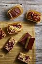 <p>Whether you make Chocolate-Peppermint, Toffee-Pecan, or Red Currant Crumble (or all three!) these cookies make the perfect after-dinner treat.</p><p><em><a href="https://www.goodhousekeeping.com/food-recipes/dessert/a46927/shortbread-squares-recipe/" rel="nofollow noopener" target="_blank" data-ylk="slk:Get the recipe for Shortbread Squares »;elm:context_link;itc:0;sec:content-canvas" class="link ">Get the recipe for Shortbread Squares »</a></em></p>