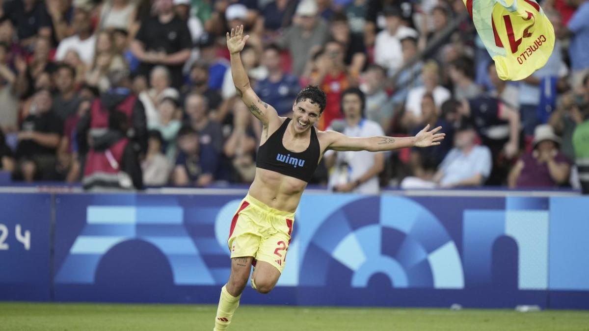 Spain crowns golden summer with victory over France