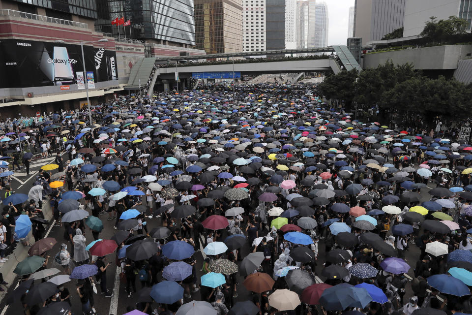 Thousands of protesters gather near the Legislative Council in Hong Kong on June 12, 2019. Until early April 2021, Mike Hui was a photojournalist for the Apple Daily, a pro-democracy newspaper that shut down following the arrest of five top editors and executives and the freezing of its assets under a national security law that China's ruling Communist Party imposed on Hong Kong as part of the crackdown. (AP Photo/Kin Cheung)