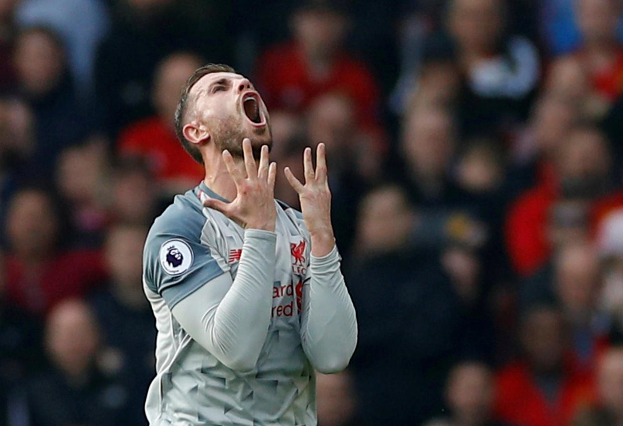 Liverpool captain Jordan Henderson reacts during their English Premier League clash against Manchester United. (PHOTO: Reuters/Phil Noble)