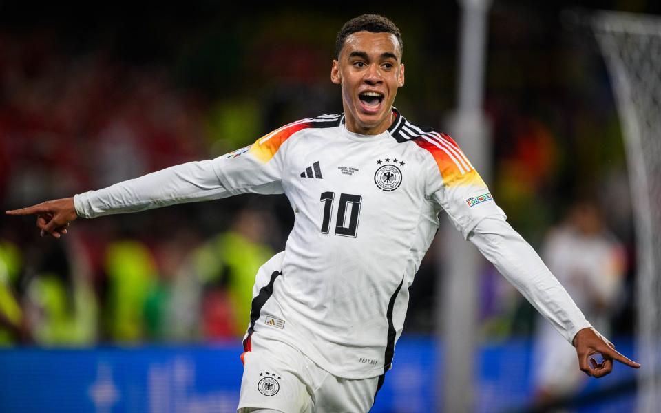 Jamal Musiala celebrates scoring against Denmark for Germany at Euro 2024