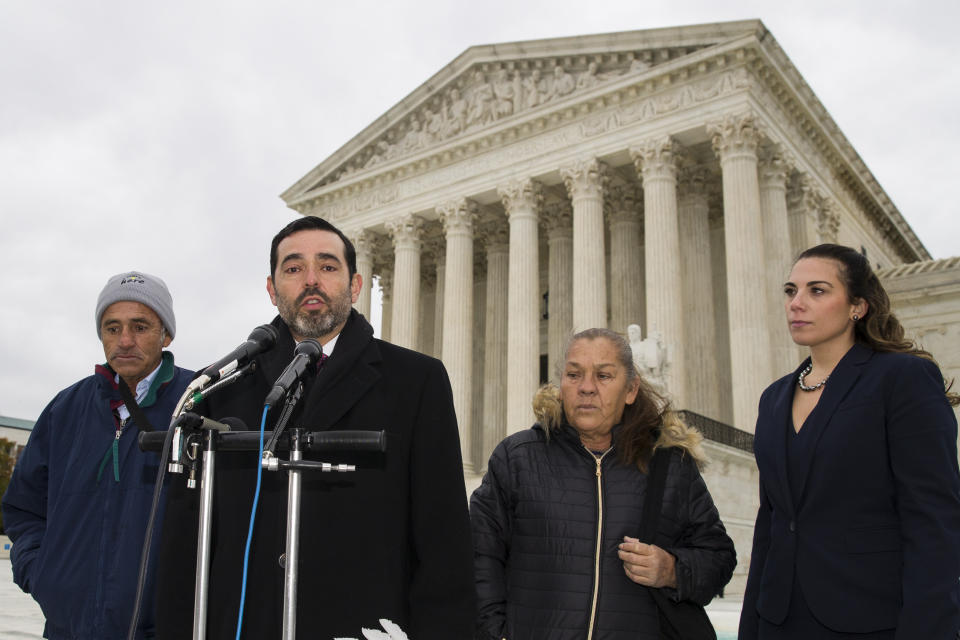 Attorney Cristobal Galindo, second from left, speaks accompanied by Jesus Hernandez, left, and Maria Guereca, and attorney Marion Reilly in front of the Supreme Court, Tuesday, Nov. 12, 2019, in Washington, after oral arguments. The case involves U.S. border patrol agent Jesus Mesa, Jr., who fired at least two shots across the Mexican border, killing Sergio Adrian Hernandez Guereca, 15, who'd been playing in the concrete culvert between El Paso and Cuidad Juarez. (AP Photo/Alex Brandon)