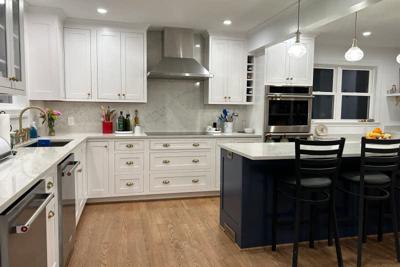 White cabinets in kitchen after renovation.