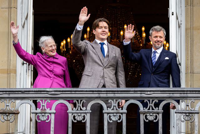 <p>Patrick van Katwijk/Getty</p> Queen Margrethe of Denmark, Prince Christian of Denmark, and Crown Prince Frederik of Denmark at the balcony of Amalienborg Palace on Prince Christian's 18th birthday on Oct. 15, 2023.