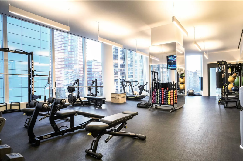 The gym is just one part of the lavish fitness center inside 50 West. - Screenshot: MLS