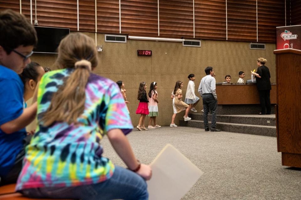 Windsor Park third grade students, pre-elected to a mock city council, are seated at the head of the CCISD school board room before a debate on community gardens on Tuesday, Oct. 24, 2023, in Corpus Christi, Texas.