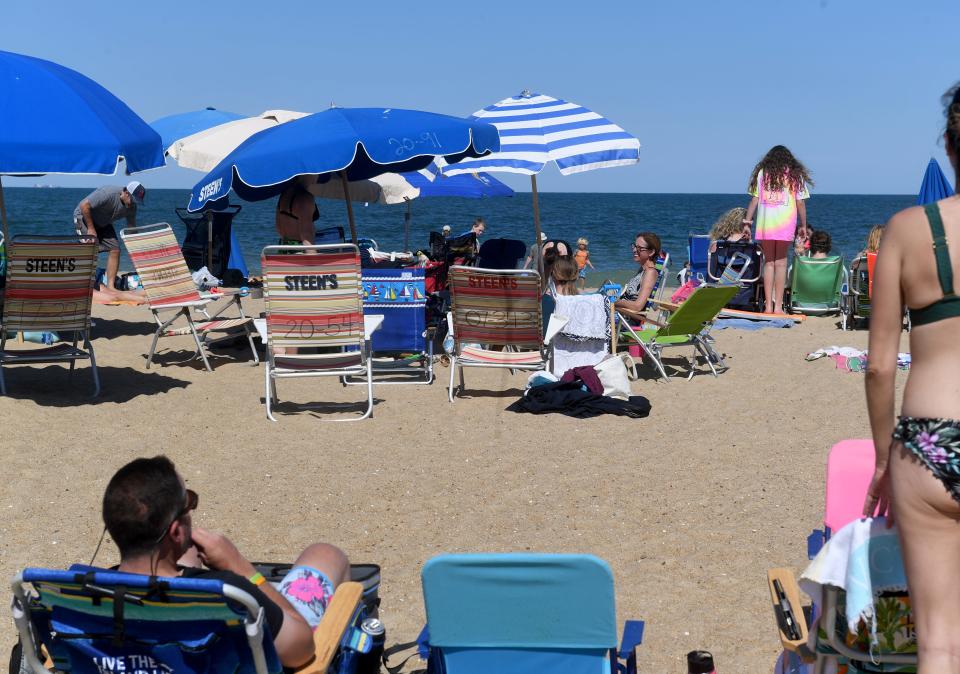 Thousands play and relax on the beach Thursday, June 17, 2021, in Bethany Beach, Delaware.