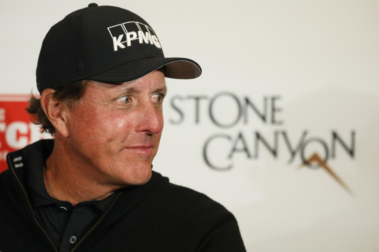 Phil Mickelson neither admitted nor denied guilt in connection with an insider-trading scheme involving Dean Foods. (Christian Petersen/Getty Images)