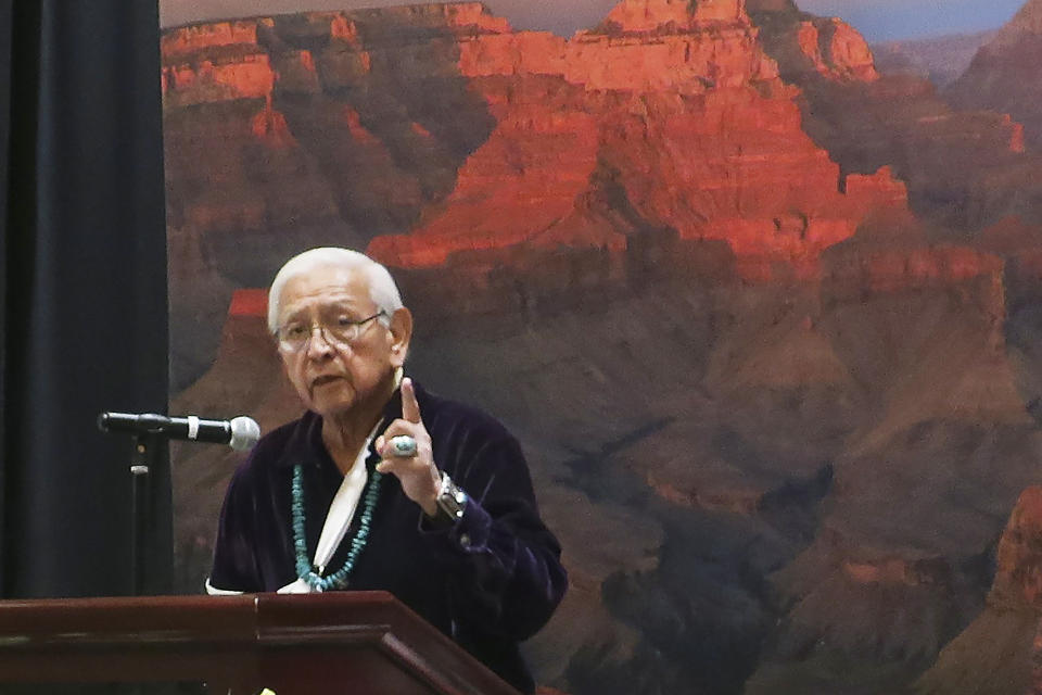 FILE - Former Navajo chairman and president, Peterson Zah, speaks to a crowd gathered to honor his work in promoting Navajo language and culture, inspiring youth and strengthening tribal sovereignty on Jan. 11 2022, at the Navajo Nation casino east of Flagstaff, Ariz. Zah, a monumental Navajo Nation leader who guided the tribe through a politically tumultuous era and worked tirelessly to correct wrongdoings against Native Americans, has died. He died late Tuesday, March 7, 2023, at a hospital in Fort Defiance , Arizona, after a lengthy illness, Navajo President Buu Nygren's office said. He was 85. (AP Photo/Felicia Fonseca, File)