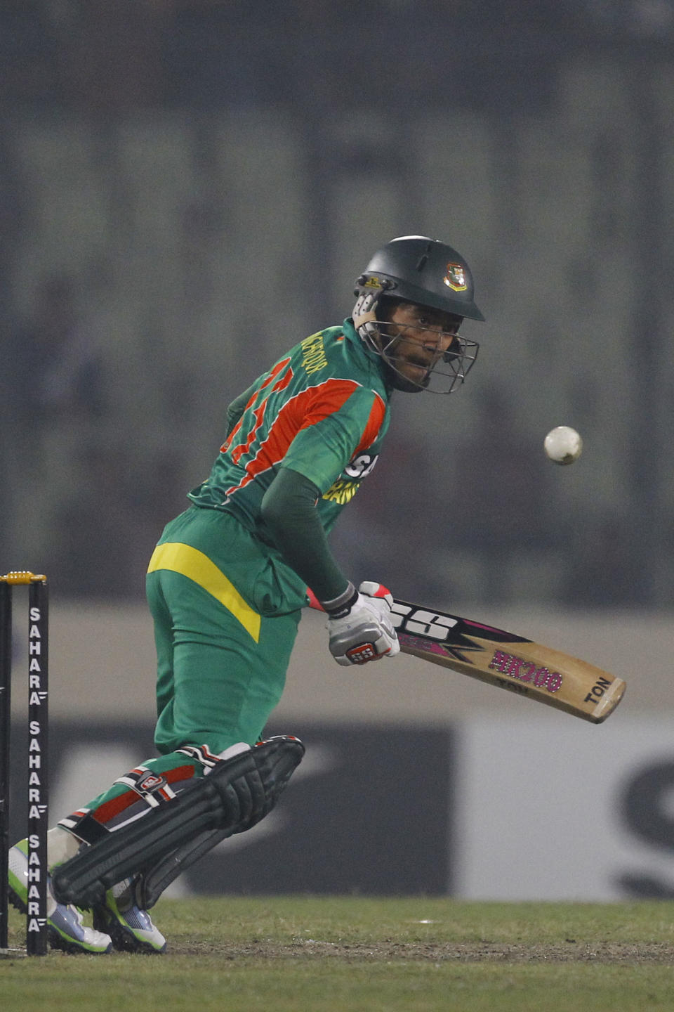 Bangladesh's Mushfiqur Rahim plays a shot during their second one-day international (ODI) cricket match against Sri Lanka in Dhaka, Bangladesh, Thursday, Feb. 20, 2014. (AP Photo/A.M. Ahad)