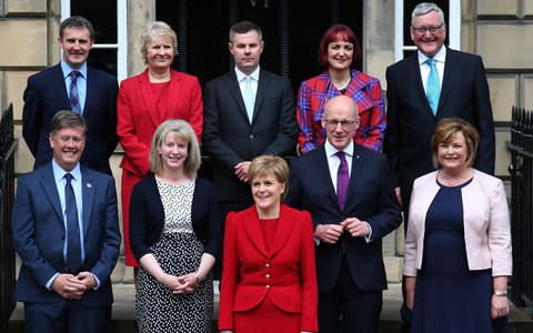 Fergus Ewing (back row, far right) with the rest of the Scottish Cabinet - Credit: PA