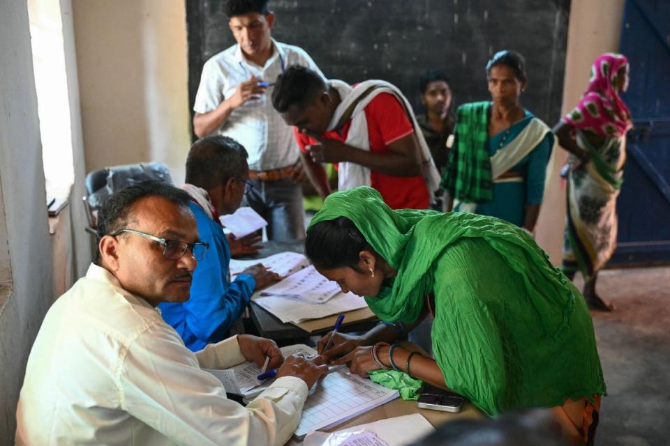 A voter registers to vote in the village of Dugeli (AFP via Getty Images)