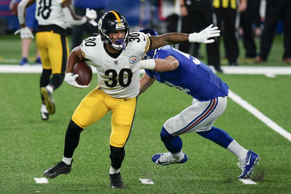 Pittsburgh Steelers running back James Conner (30) runs the ball against the New York Giants during the second quarter of an NFL football game Monday, Sept. 14, 2020, in East Rutherford, N.J. (AP Photo/Seth Wenig)