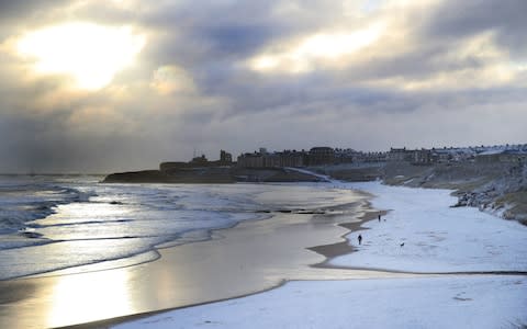 Tynemouth beach in the North East covered in snow - Credit: Owen Humphreys/PA