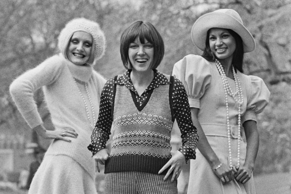 Mary Quant with two models wearing her designs in London in 1972 (Getty Images)