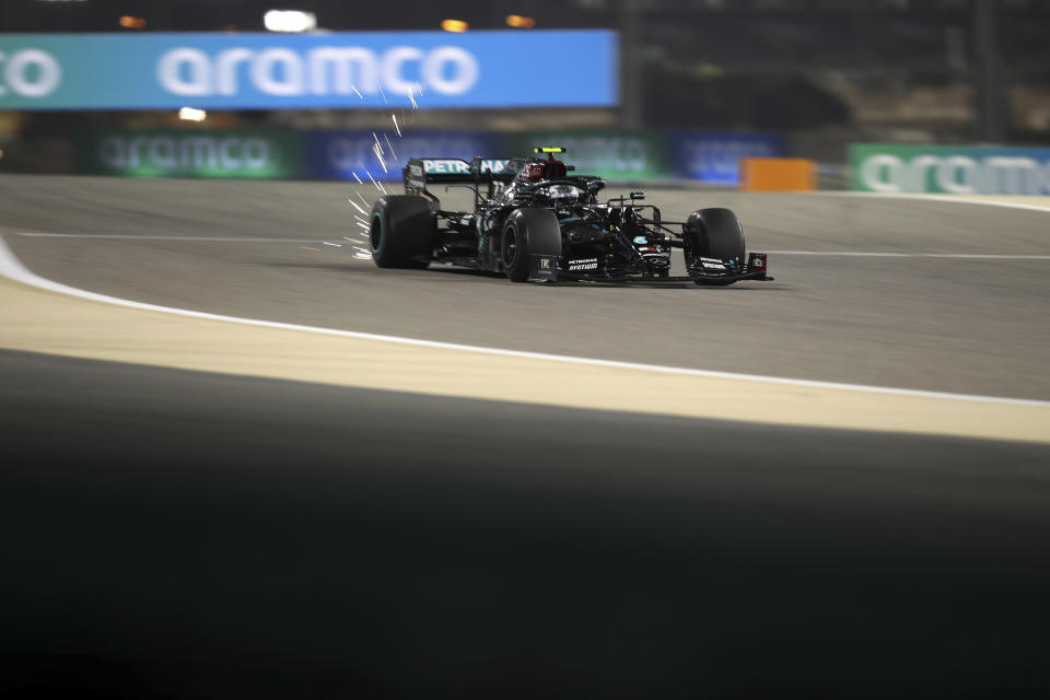 Mercedes driver Valtteri Bottas of Finland steers his car during the second free practice at the Formula One Bahrain International Circuit in Sakhir, Bahrain, Friday, Nov. 27, 2020. (Tolga Bozoglu, Pool via AP)