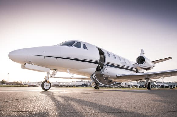 A small aircraft on a runway.