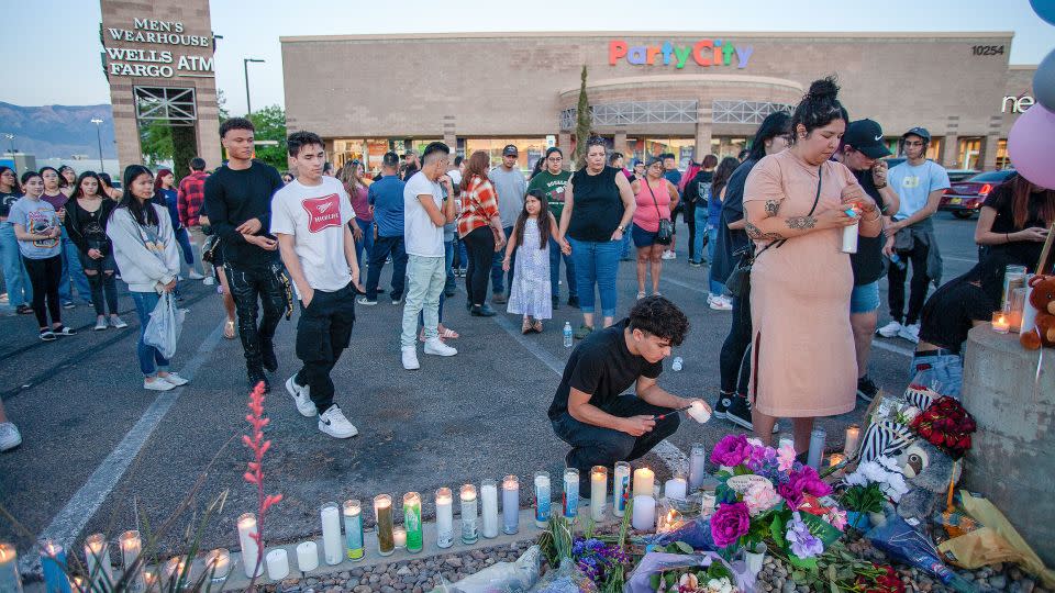 Mourners light candles during a vigil for Alexia Rael and her cousin Mario Salgado-Rosales on May 10, 2022, in Albuquerque, New Mexico. - Adolphe Pierre-Louis/Albuquerque Journal/Zuma/Newscom