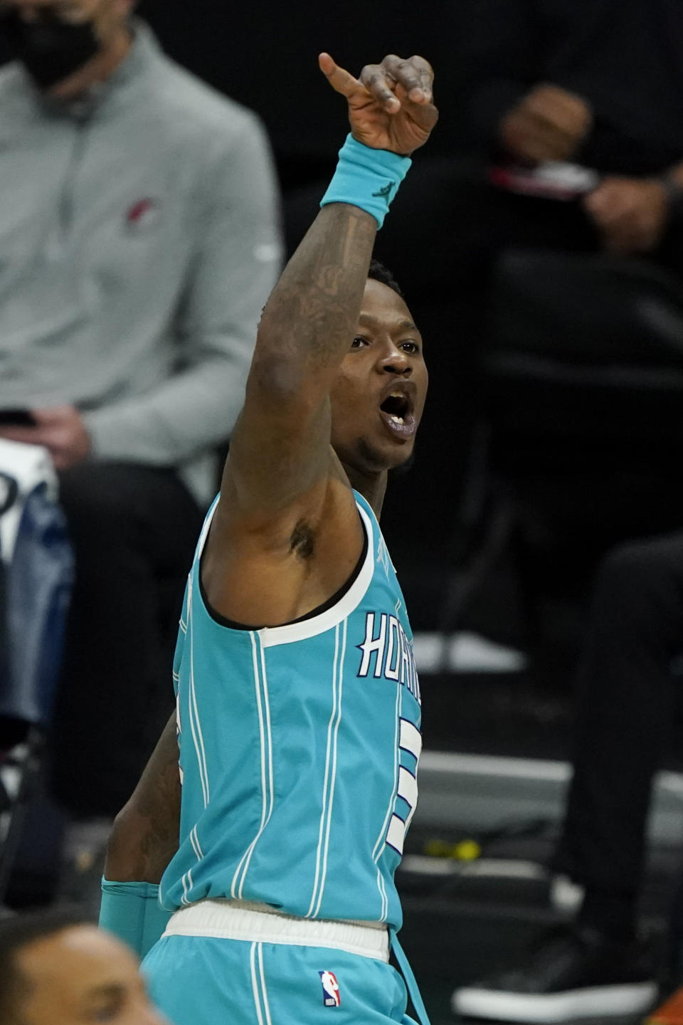 Charlotte Hornets guard Terry Rozier celebrates after scoring against the Portland Trail Blazers during the second half in an NBA basketball game on Sunday, April 18, 2021, in Charlotte, N.C. (AP Photo/Chris Carlson)