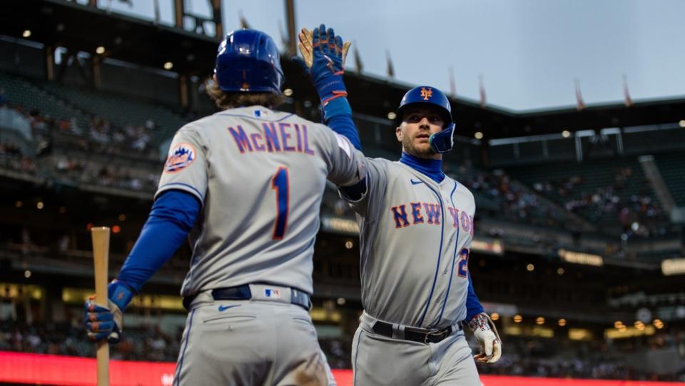 Apr 20, 2023;  San Francisco, California, USA;  New York Mets first baseman Pete Alonso (20) is congratulated by right fielder Jeff McNeil (1) after hitting a two-run home run against the San Francisco Giants during the fourth inning at Oracle Park.