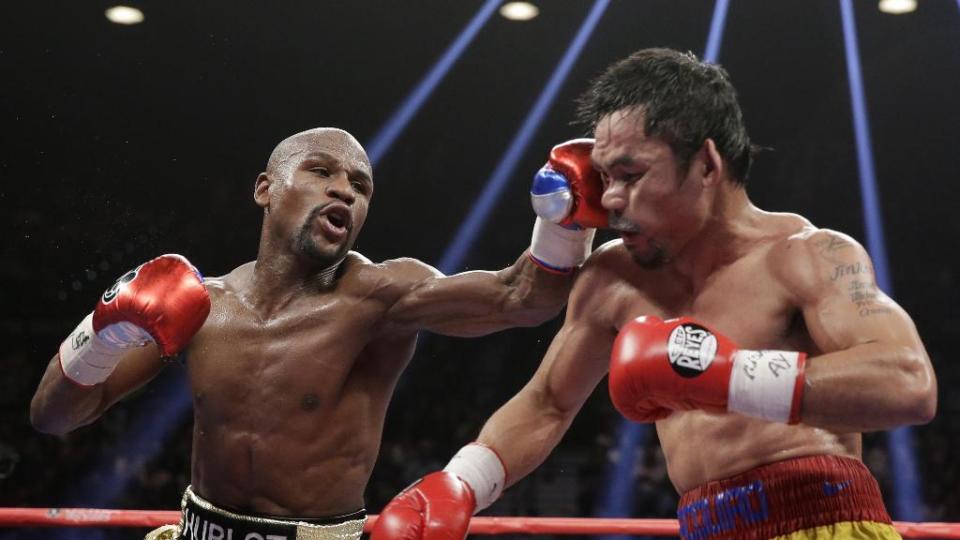 Floyd Mayweather 跟 Manny Pacquiao( 圖/AP )