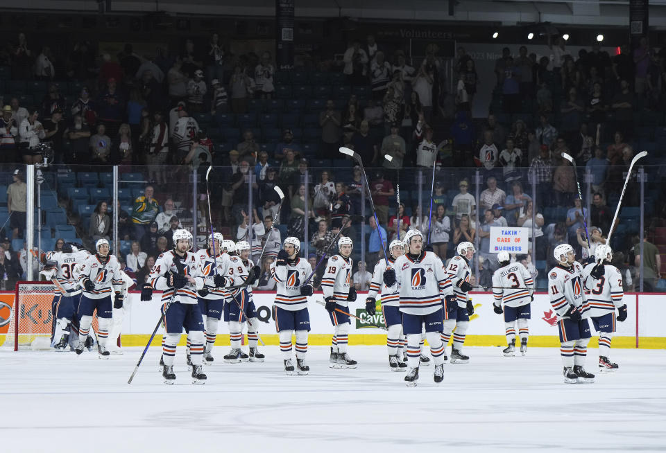 Kamloops Blazers players salute the crowd after defeating the Peterborough Petes during CHL Memorial Cup hockey game action in Kamloops, British Columbia, Sunday, May 28, 2023. (Darryl Dyck/The Canadian Press via AP)