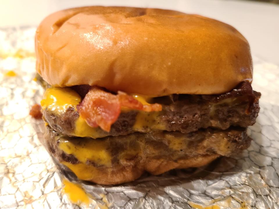 wendys bacon jalepeno double cheeseburger on white wrapper