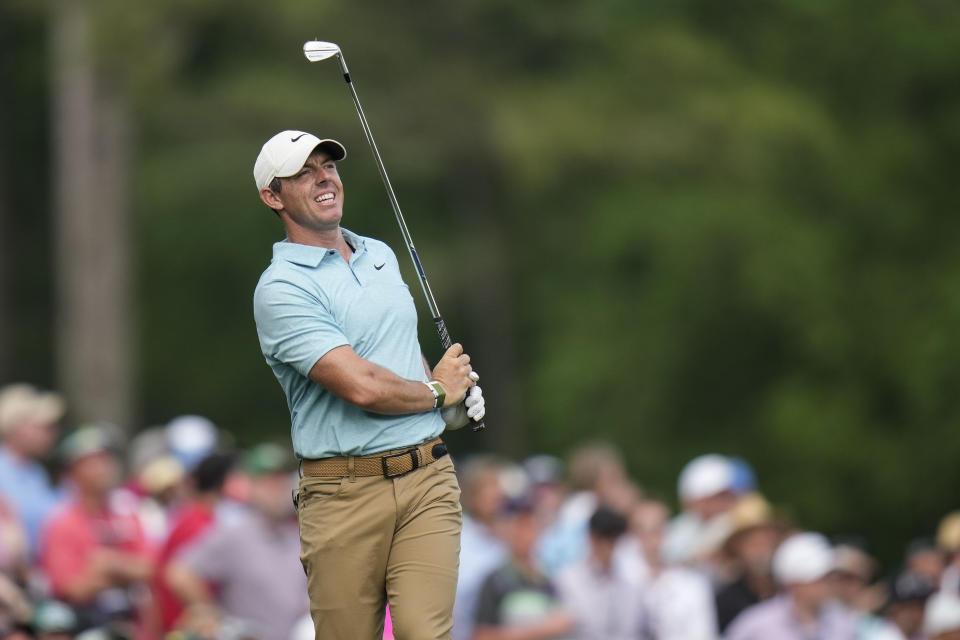 Rory McIlroy, of Northern Ireland, watches his tee shot on the 12th hole during the first round of the Masters golf tournament at Augusta National Golf Club on Thursday, April 6, 2023, in Augusta, Ga. (AP Photo/Jae C. Hong)