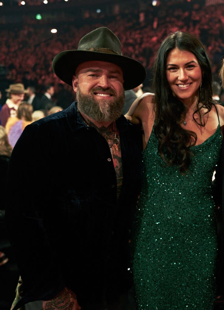 Zac Brown alleges that his estranged 33-year-old model wife, Kelly Yazdi, violated a confidentiality agreement she had signed with him by making the post. Getty Images for CMA