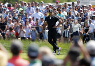 Brooks Koepka waits to putt on the first green during the third round of the PGA Championship golf tournament, Saturday, May 18, 2019, at Bethpage Black in Farmingdale, N.Y. (AP Photo/Andres Kudacki)