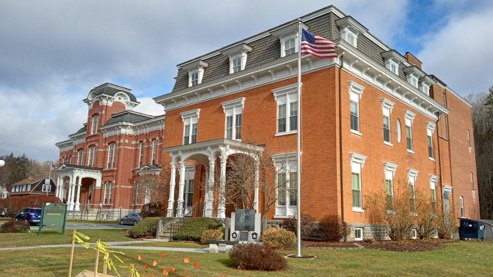 The Samuel E. Dimmick Mansion was built at the corner of Court and 9th streets, Honesdale, in 1869. In 1920, the Wayne County Memorial Hospital started there, and it was purchased in 1952 for the Honesdale Gospel Tabernacle. In 1997, after extensive restoration by the county, it was rededicated for county offices. The courthouse is at left. Other recent major county expansion projects have included opening of the Park Street Complex in 2004 at the former Stourbridge Elementary School annex; opening of the new county prison in Indian Orchard in 2008; and erection of the 911/Emergency Management facility in Berlin Township in 2009.