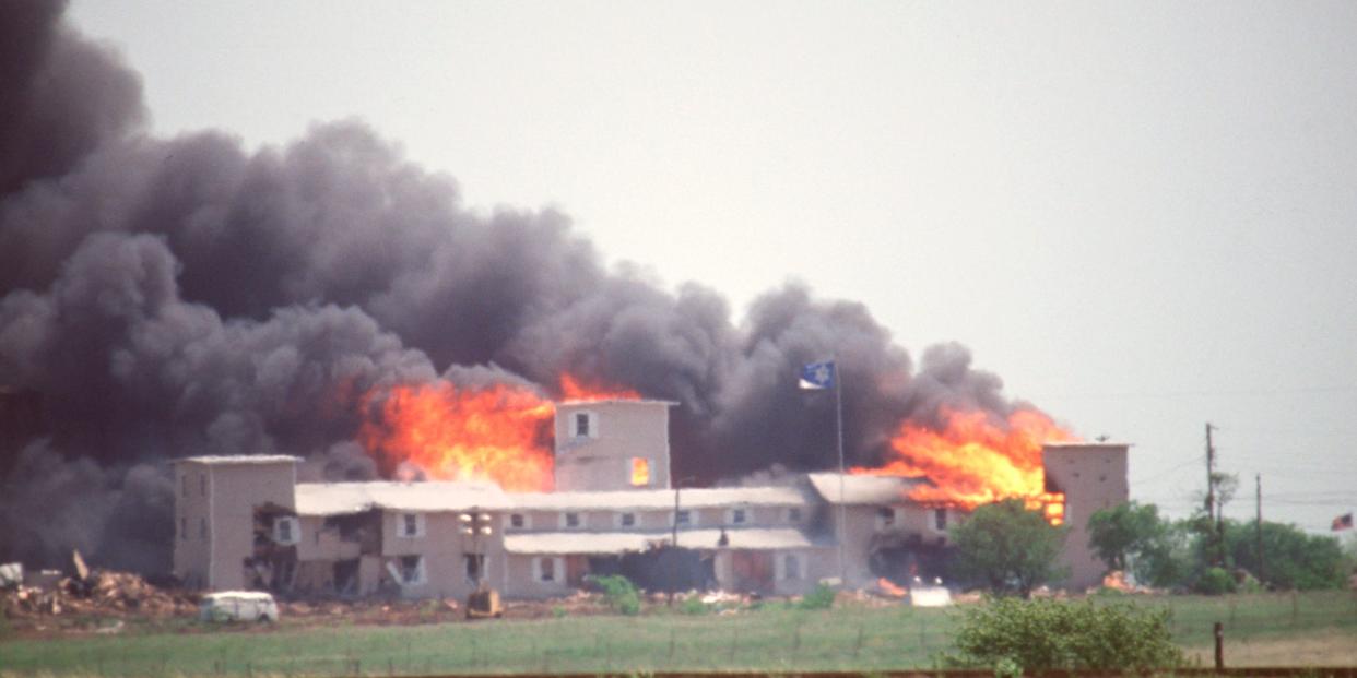 Smoking fire consumes the Branch Davidian Compound in Waco, Texas