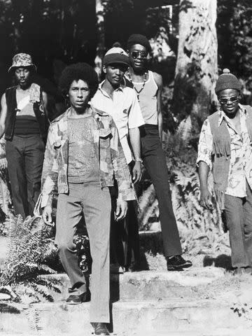 <p>Michael Ochs Archives/Getty</p> Bob Marley (second from left) with his band the Wailers, circa 1972. L-R Earl Lindo, Carlton Barrett, Peter Tosh, Aston Family Man Barrett
