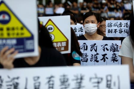 Members of Hong Kong's medical sector attend a rally to support the anti-extradition bill protest in Hong Kong