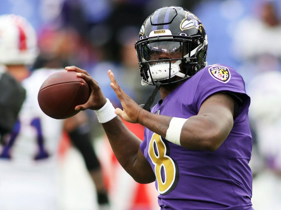 Lamar Jackson warms up ahead of a game against the Buffalo Bills.