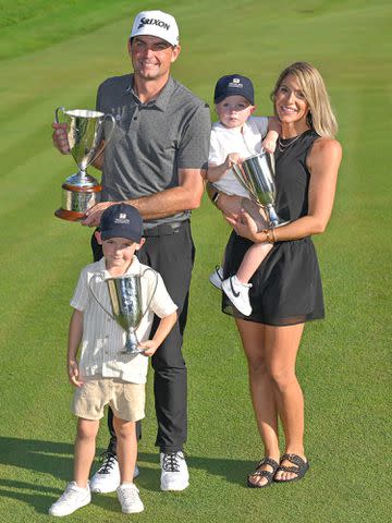 <p>Ben Jared/PGA TOUR/Getty</p> Keegan Bradley, Jillian Bradley, and kids stand with the trophy after the final round of the Travelers Championship on June 25, 2023 in Cromwell, Connecticut.