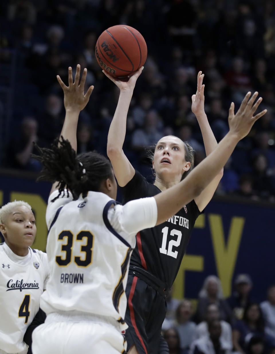 Stanford's Lexie Hull, right, shoots against California's Jaelyn Brown (33) in the first half of an NCAA college basketball game Sunday, Jan. 12, 2020, in Berkeley, Calif. (AP Photo/Ben Margot)