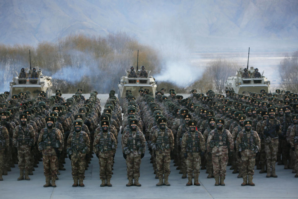 TOPSHOT - This photo taken on January 4, 2021 shows Chinese People's Liberation Army (PLA) soldiers assembling during military training at Pamir Mountains in Kashgar, northwestern China's Xinjiang region. (Photo by STR / AFP) / China OUT (Photo by STR/AFP via Getty Images)