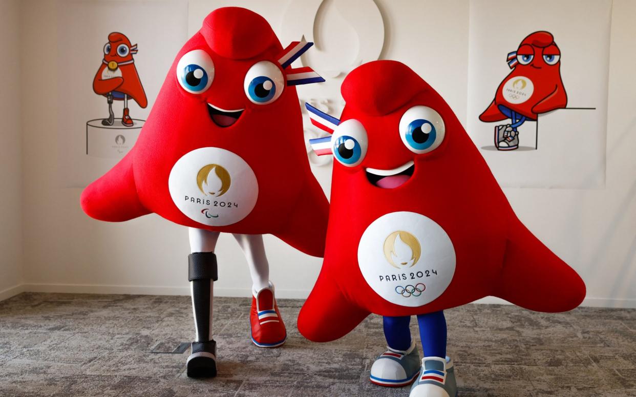 Mascots dressed as Phrygian caps - Gonzalo Fuentes/Reuters