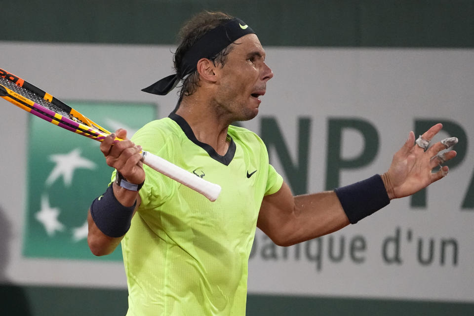 Spain's Rafael Nadal reacts. As he plays Serbia's Novak Djokovic rduring their semifinal match of the French Open tennis tournament at the Roland Garros stadium Friday, June 11, 2021 in Paris. (AP Photo/Michel Euler)