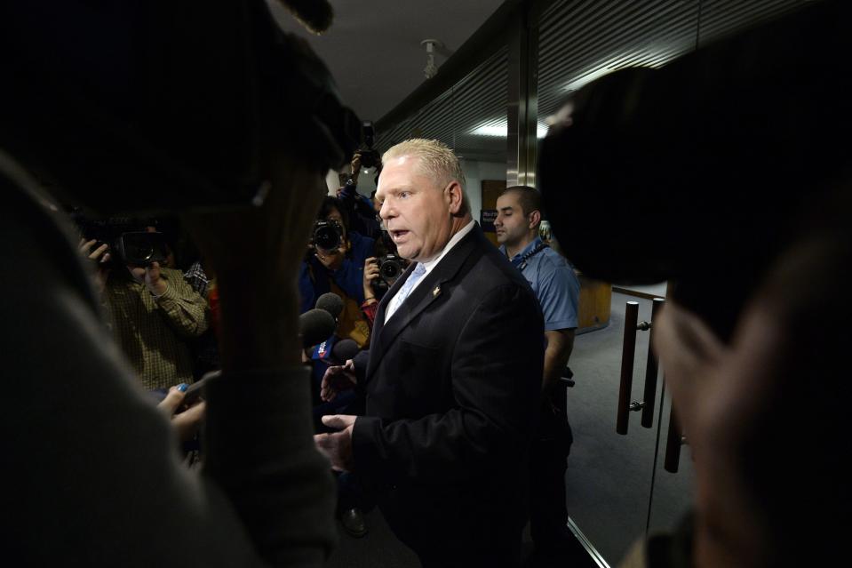 City councillor Doug Ford, brother of Toronto Mayor Rob Ford, speaks to the media after a special council meeting at City Hall in Toronto