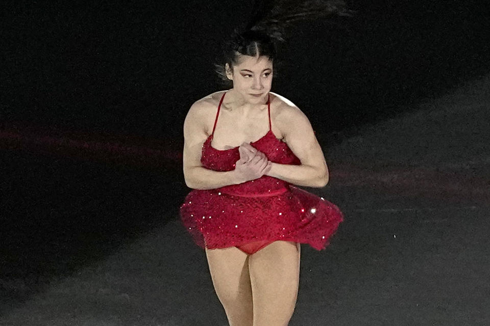 FILE - Alysa Liu, of the United States, performs during the figure skating gala at the 2022 Winter Olympics, on Feb. 20, 2022, in Beijing. U.S. Olympic figure skater Alysa Liu and her father Arthur Liu – a former political refugee – were among those targeted in a spying operation that the Justice Department alleges was ordered by the Chinese government, the elder Liu said late Wednesday, March 16. (AP Photo/David J. Phillip, File)