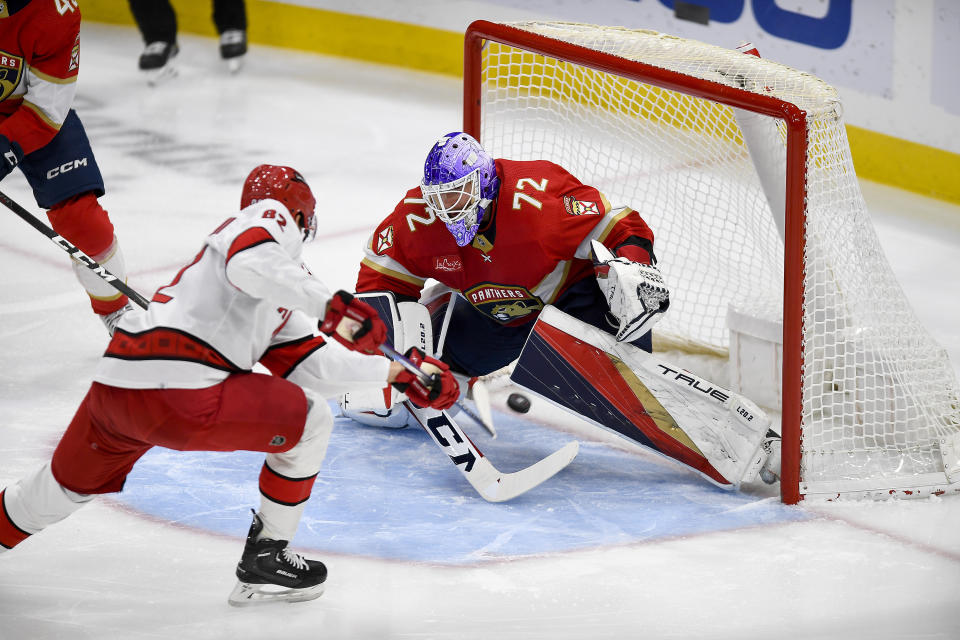 Florida Panthers goaltender Sergei Bobrovsky (72) gives up a goal to Carolina Hurricanes center Jesperi Kotkaniemi (82) during the first period of an NHL hockey game Friday, Nov. 10, 2023, in Sunrise, Fla. (AP Photo/Michael Laughlin)