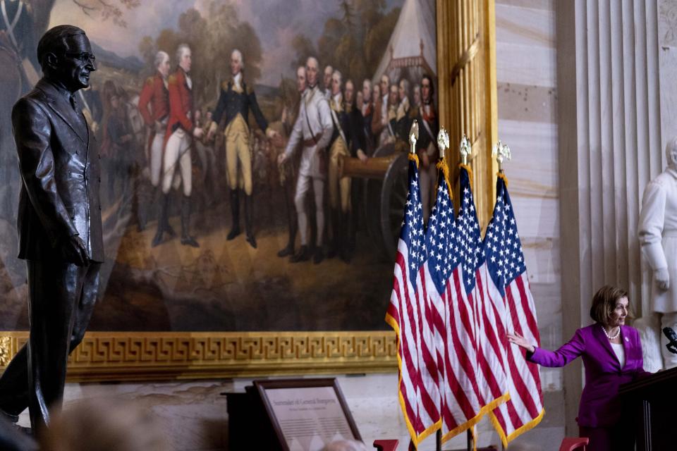 House Speaker Nancy Pelosi of Calif., right, speaks after unveiling the Congressional statue of former President Harry S. Truman during a ceremony in the Rotunda of the U.S. Capitol Building in Washington, Thursday, Sept. 29, 2022. (AP Photo/Andrew Harnik)