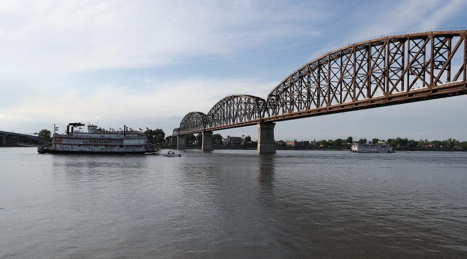 The Belle of Cincinnati took the lead against Belle of Louisville as they passed the Big Four Bridge during the Great Steamboat Race on the Ohio River in Louisville, Ky. on May. 1, 2024.