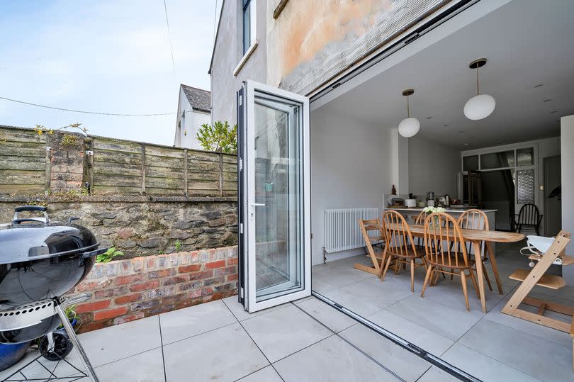 The whole of the rear wing wall is now bifold doors out to the garden