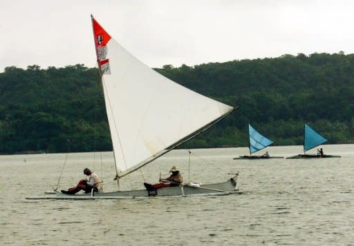 A sailing race is held in the seas off the Philippines city of Sulangan in 1999. A major 7.9 earthquake hit the sea area east of the Philippines on Friday and a tsunami warning was issued for the Philippines, Indonesia, Taiwan and Japan, US seismologists said. The USGS said the quake had a depth of 33 kilometres (20 miles) and hit at 8:47 pm (1247 GMT) some 139 kilometres east of Sulangan