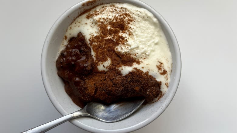 bowl of mexican hot chocolate rice pudding with a spoon in it