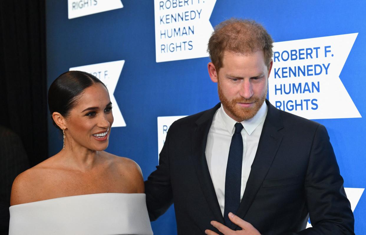 Prince Harry, Duke of Sussex, and Meghan, Duchess of Sussex, arrive at the 2022 Robert F. Kennedy Human Rights Ripple of Hope Award Gala at the Hilton Midtown in New York on December 6, 2022. (Photo by ANGELA WEISS / AFP) (Photo by ANGELA WEISS/AFP via Getty Images)