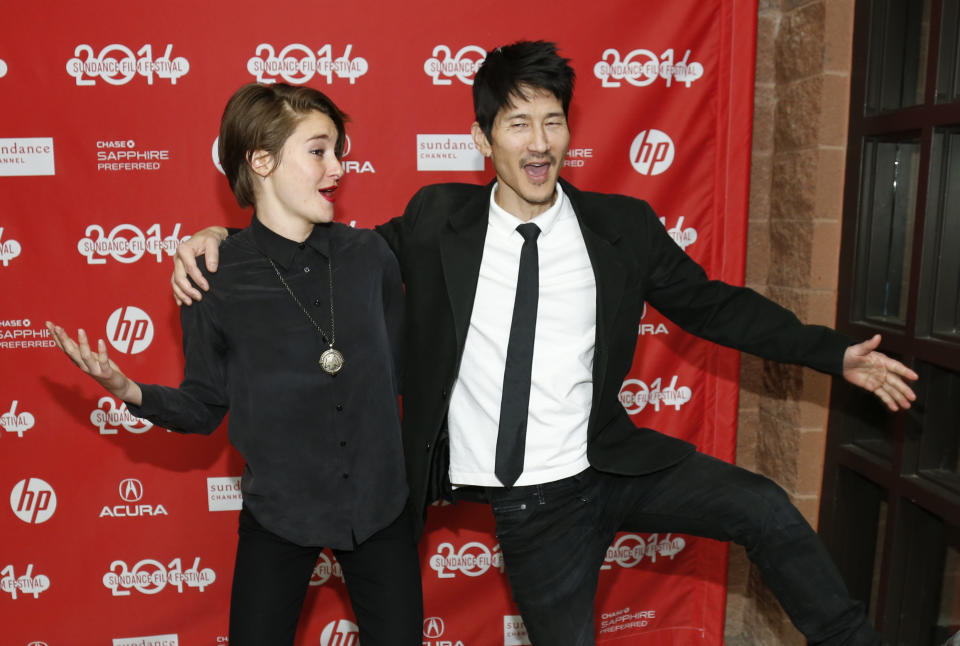 Cast member Shailene Woodley, left, and screenwriter and director Gregg Araki pose together at the premiere of the film "White Bird in a Blizzard" during the 2014 Sundance Film Festival, on Monday, Jan. 20, 2014, in Park City, Utah. (Photo by Danny Moloshok/Invision/AP)